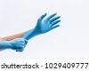 glove hand holding