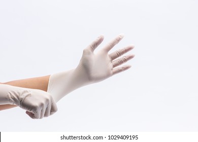 Human Holding Variation Of Latex Glove, Rubber Glove Manufacturing, Human Hand Is Wearing A Medical Glove, Glove
