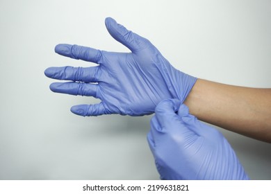 Human Holding Variation Of Latex Glove, Rubber Glove Manufacturing, Human Hand Is Wearing A Medical Glove, Glove, Isolated