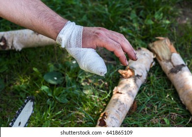 Human Injury On Hand Finger After Accident With Chainsaw