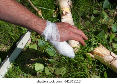 Human Injury On Hand Finger After Accident With Chainsaw