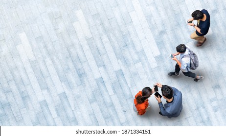 Human Life In Social Distance. Aerial Top View With Blur Men And People With Smartphone And Group Of People Walking At Pedestrian Crosswalk On Grey Pavement Street Road With Empty Space.