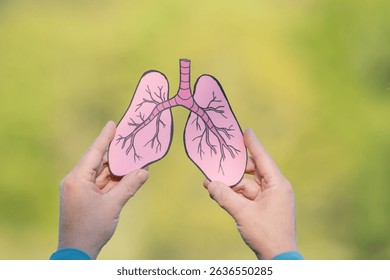 Human lung in front of forest, trees for fresh healthy breathing air, pollution causing asthma health issue, environment concept