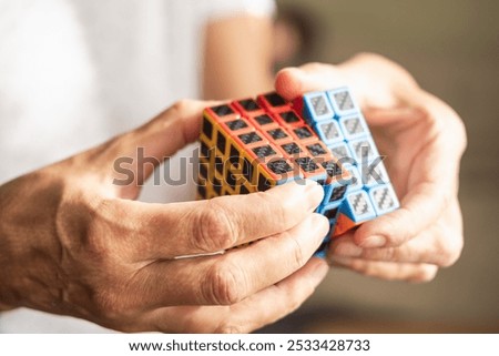 Human mind and hands is solving alternative Rubik's cube