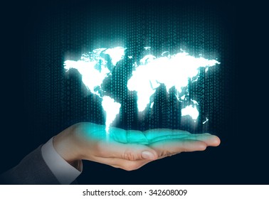 Human open hand with world map on the matrix background. Elements of this image furnished by NASA
