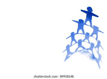 Human pyramid standing on plain background - Powered by Shutterstock