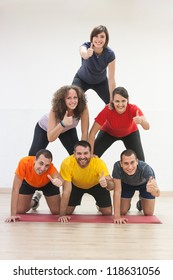 Human Pyramid And Thumbs Up