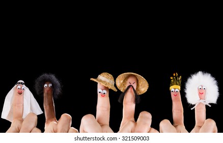 Human races and diversity symbolized with isolated finger puppets