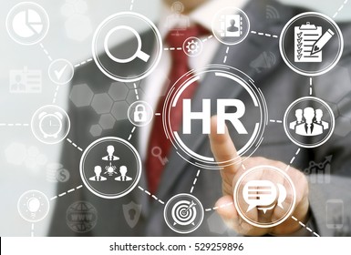 Human resource business concept. HR word button. Businessman presses hr icon on virtual screen on background of network business success sign.