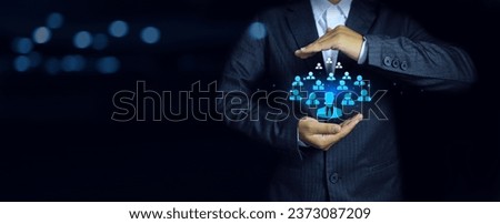 Human resource development concept. Businessman holding employee organization training development skill building strong efficient team. Staff in hand of HRD department represent quality output person