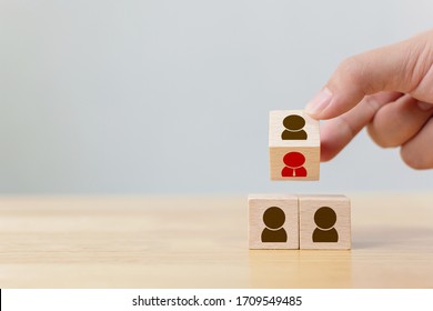 Human resource management and recruitment business concept, Hand flip over wood cube block on top pyramid, Copy space - Shutterstock ID 1709549485