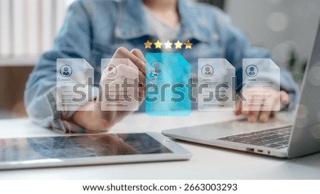 Human resource manager analyzing digital resumes with five-star rating system, selecting best candidate using AI technology and data-driven recruitment process.