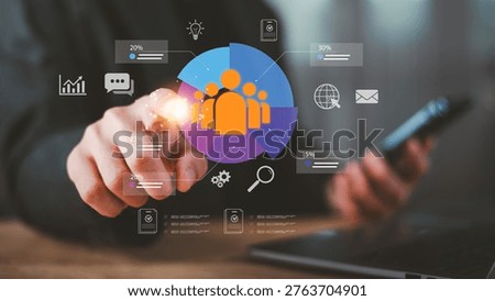 human resource manager analyzing team performance with digital pie chart dashboard, employee segmentation, workforce analytics, talent management, data driven decision making ,modern HR technology