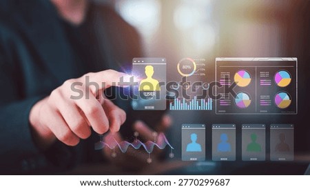 Human resource manager analyzing user data and employee analytics through virtual dashboard, focusing on workforce management, talent tracking, HR technology, performance metrics, business insight
