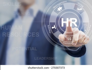 Human resources concept with manager in office touching white board computer interface about skills, training and performance