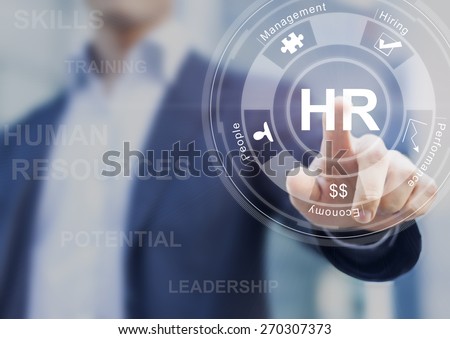 Human resources concept with manager in office touching white board computer interface about skills, training and performance