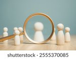 human resources, hr, human, resource, employee, recruitment, job, manager, hiring, executive. A group of people are standing in front of a magnifying. Concept of curiosity and intrigue.