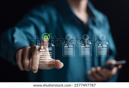 Human Resources management concept. Checking cv resume on virtual screen. Recruitment process to work efficiently and achieve sustainable business success. team building. 