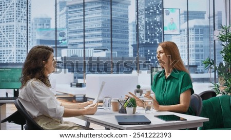 Human resources manager conducts interview with job seeker in modern office, discussing long term career goals and qualifications for the vacant position within the company. Recruitment. Camera B.