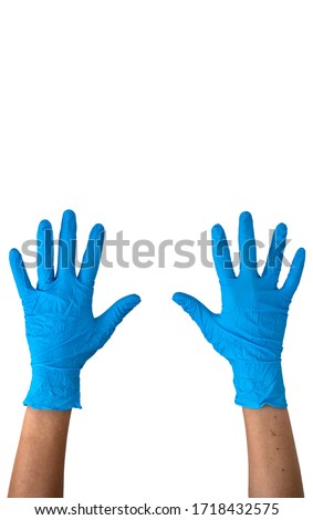 Human rising hands wearing blue disposable latex glove, rubber glove for professional medical safety and hygiene protection from Coronavirus disease COVID-19 and surgery and medical exam