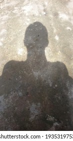 Human shadow in the morning.