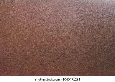 Human skin texture: Dark Brown African skin of woman