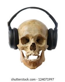Human skull dj in headphones isolated on a white background.