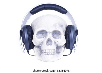 Human skull with music headphones.