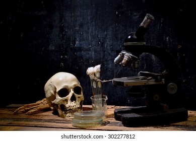 Human skull on old wood background