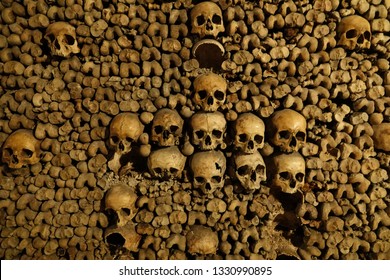 Human skulls and bones. Remains from the catacombs under the city of Paris France which hold 6.000.000 skeletons.