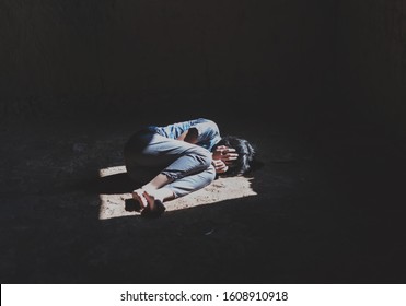 Human Trafficking Concept, Helpless Girl Lying On Floor Old Room,children Violence And Abused Concept,