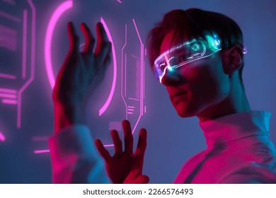 human use hi-tech with holographic graphs and visual touch screen the ability of deep learning while hold hand to interactive virtual graphic and try to understand the ai innovation of the future