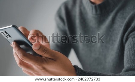 Human uses smartphone to check new mail. New email notification concept for business email communication and digital marketing. The inbox receives electronic message notifications. internet technology