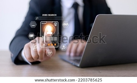 Human using a computer laptop for searching for job and fill out personal data on job website to file a resume and apply application to jobs on the internet. work search online concept.