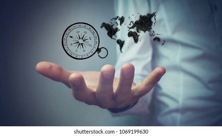 human using a navigation compass