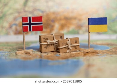 Humanitarian Aid Shipment Between Norway and Ukraine Depicted with National Flags and Parcel Boxes on World Map - Powered by Shutterstock