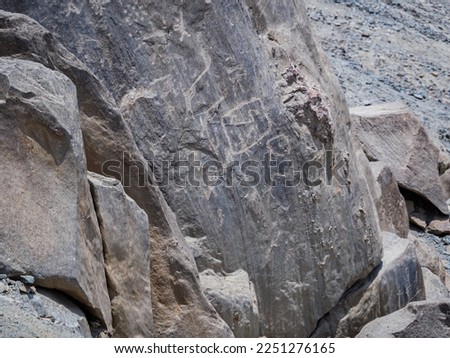 Humanoid figure carved in rock, huancor petroglyphs, Peru, South America	

