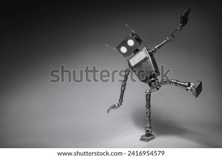 Humanoid robot takes its first step on a dark background. Concept of the future of artificial intelligence and the fourth industrial revolution.