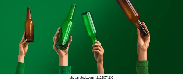 Humans hand shows used recyclable packages materials of bottle glass transparent. Many glass bottles separe and prepared for recycling. Concept of responsible, care and save the world. Wide banner. - Shutterstock ID 2122074233