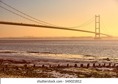 Humber Bridge with beach in the foreground.Sunset.