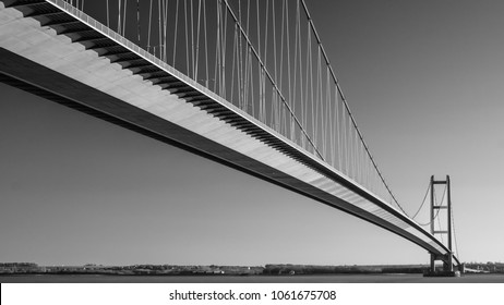 Humber Bridge near the city of Hull, East Yorkshire, United Kingdom. Black and white treatment.