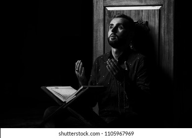 Humble Muslim Man Is Reading The Koran In The Mosque