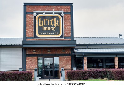 Humble, Texas USA 03-25-2020: Brick House Tavern And Tap Sports Bar Exterior In Humble TX. Focus On The Main Front Entrance And Sign.