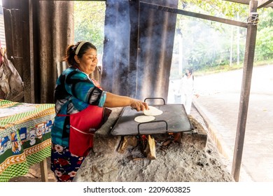 Humble Woman From Nicaragua Cooking Tortillas To Earn Money