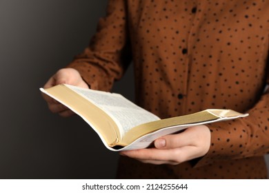 Humble Woman Reading Bible, Closeup. Religious Literature