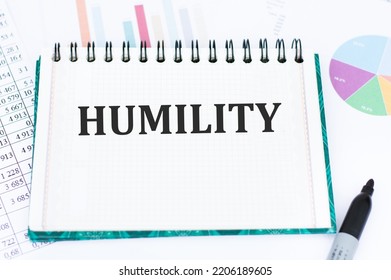 Humility Inscription On A Notebook On An Office Desk, A Business Concept