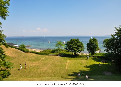 Humlebaek, Fredensborg Municipality, Denmark. 05 JUNE 2018: The Green Glass Field Connect To The Oresund Ocean At Louisiana Museum Of Modern Art. 