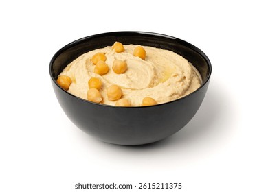 Hummus in black bowl isolated, houmous dip, chickpea humus tahini sauce, middle eastern spread, arabic hummus on white background