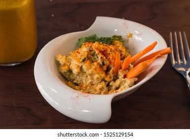 Hummus With Carrot And Sesame Sticks. Healthy Dish Close-up