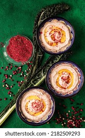 Hummus, Chickpea Dip, With Spices And Peppercorn On A Plate. Top View. 